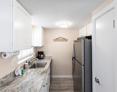 6020 Midnight Pass Road - Photo Thumbnail 5