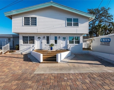 6020 Midnight Pass Road - Photo Thumbnail 1
