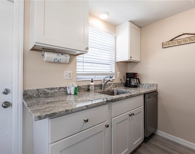 6020 Midnight Pass Road - Photo Thumbnail 6
