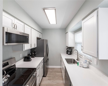 6020 Midnight Pass Road - Photo Thumbnail 8