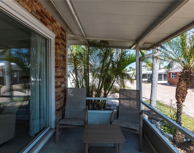 6020 Midnight Pass Road - Photo Thumbnail 4