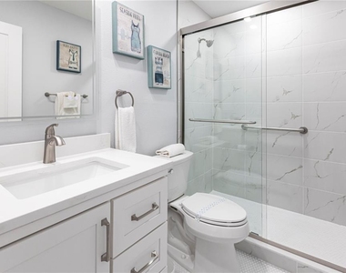 6020 Midnight Pass Road - Photo Thumbnail 11