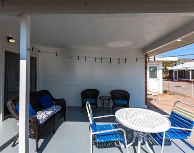 6020 Midnight Pass Road - Photo Thumbnail 1