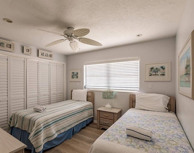 6020 Midnight Pass Road - Photo Thumbnail 8
