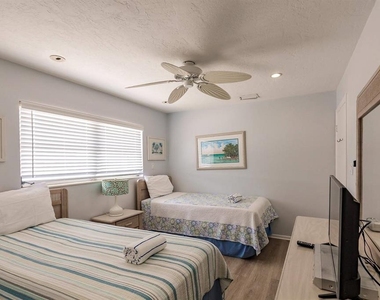 6020 Midnight Pass Road - Photo Thumbnail 9