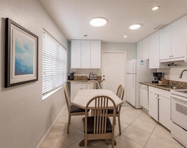 6020 Midnight Pass Road - Photo Thumbnail 5
