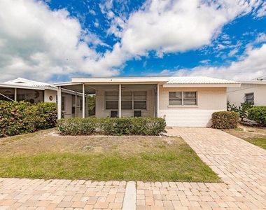 6020 Midnight Pass Road - Photo Thumbnail 1