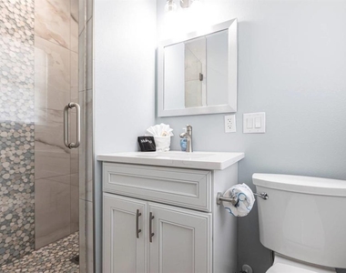 6020 Midnight Pass Road - Photo Thumbnail 10