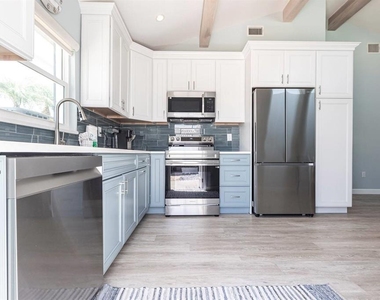6020 Midnight Pass Road - Photo Thumbnail 5