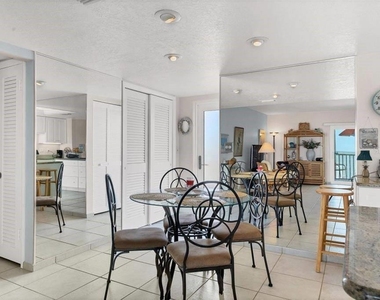 6154 Midnight Pass Road - Photo Thumbnail 3
