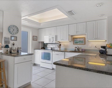6154 Midnight Pass Road - Photo Thumbnail 4