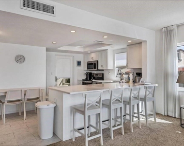 6154 Midnight Pass Road - Photo Thumbnail 7