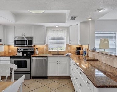 6154 Midnight Pass Road - Photo Thumbnail 4