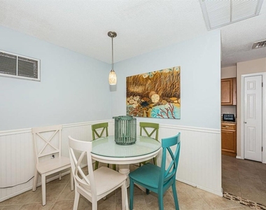 6020 Midnight Pass Road - Photo Thumbnail 4