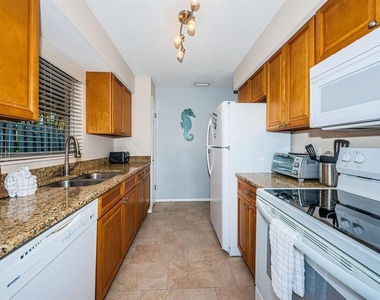 6020 Midnight Pass Road - Photo Thumbnail 7