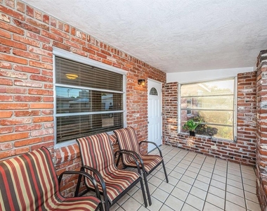6020 Midnight Pass Road - Photo Thumbnail 3