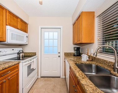 6020 Midnight Pass Road - Photo Thumbnail 6