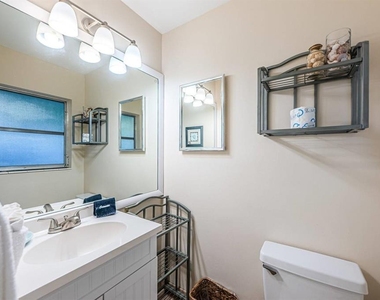 6020 Midnight Pass Road - Photo Thumbnail 10