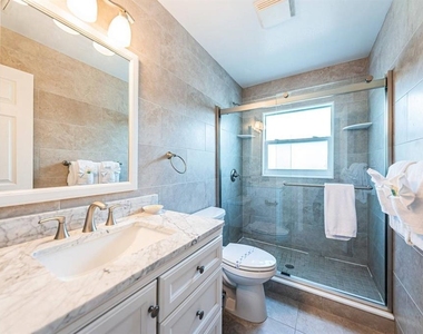 6020 Midnight Pass Road - Photo Thumbnail 13