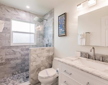 6020 Midnight Pass Road - Photo Thumbnail 7