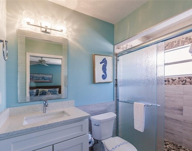 6020 Midnight Pass Road - Photo Thumbnail 11