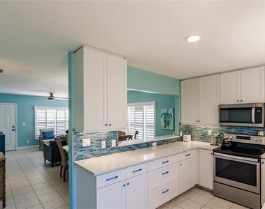 6020 Midnight Pass Road - Photo Thumbnail 5