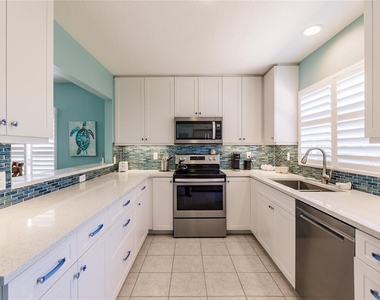 6020 Midnight Pass Road - Photo Thumbnail 4