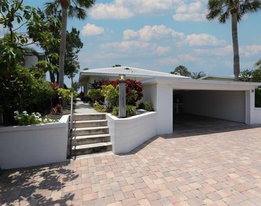 6020 Midnight Pass Road - Photo Thumbnail 3