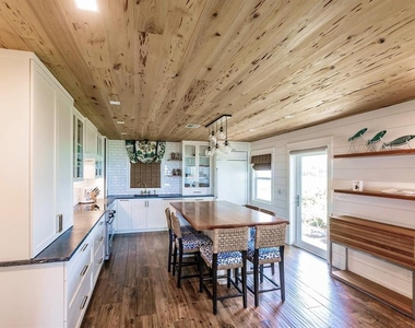 6020 Midnight Pass Road - Photo Thumbnail 9