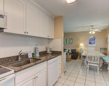 6020 Midnight Pass Road - Photo Thumbnail 4
