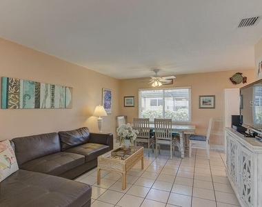 6020 Midnight Pass Road - Photo Thumbnail 2