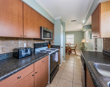 6020 Midnight Pass Road - Photo Thumbnail 11