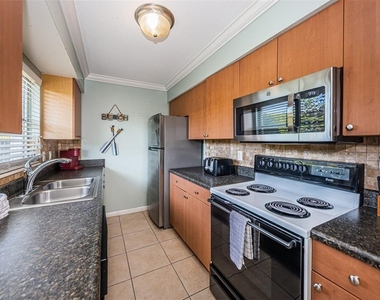6020 Midnight Pass Road - Photo Thumbnail 10