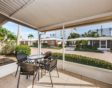 6020 Midnight Pass Road - Photo Thumbnail 3