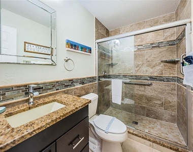 6020 Midnight Pass Road - Photo Thumbnail 14