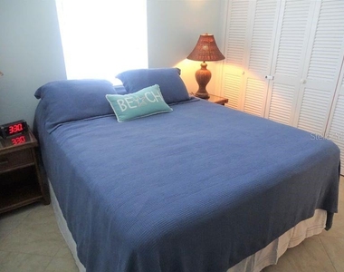 6020 Midnight Pass Road - Photo Thumbnail 4
