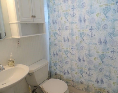 6020 Midnight Pass Road - Photo Thumbnail 5