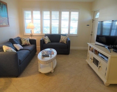 6020 Midnight Pass Road - Photo Thumbnail 3