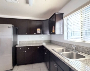 1210 W 39th Street - Photo Thumbnail 6