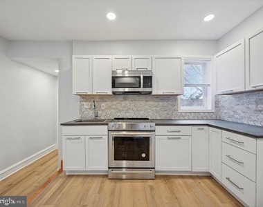 2253 N Delhi Street - Photo Thumbnail 9