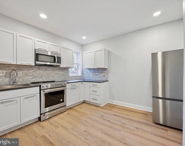 2253 N Delhi Street - Photo Thumbnail 8