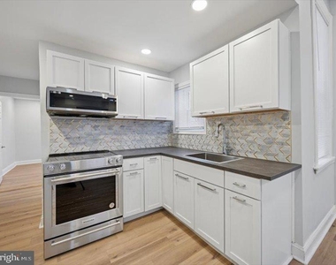 2253 N Delhi Street - Photo Thumbnail 2
