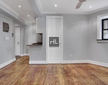 E 25th St. - Photo Thumbnail 5