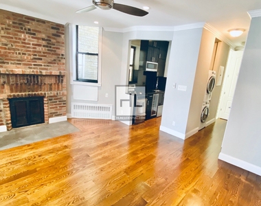 E 25th St. - Photo Thumbnail 2