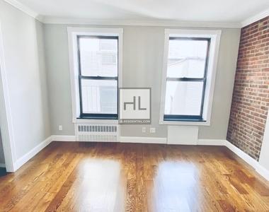 E 25th St. - Photo Thumbnail 4