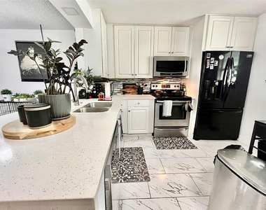 8301 Sands Point Boulevard - Photo Thumbnail 1