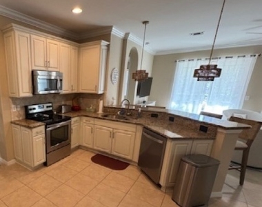 10700 Cetrella Drive - Photo Thumbnail 1
