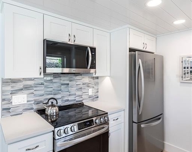 6154 Midnight Pass Road - Photo Thumbnail 1