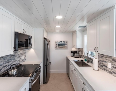 6154 Midnight Pass Road - Photo Thumbnail 11