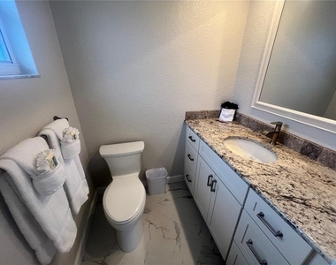 6154 Midnight Pass Road - Photo Thumbnail 10